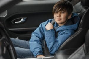 test carnet de conducir - niño asiento delantero